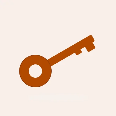 An old-fashioned key, lying diagonally